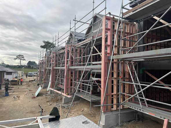 House jacked up on piles awaiting a fresh concrete pad, Waikato